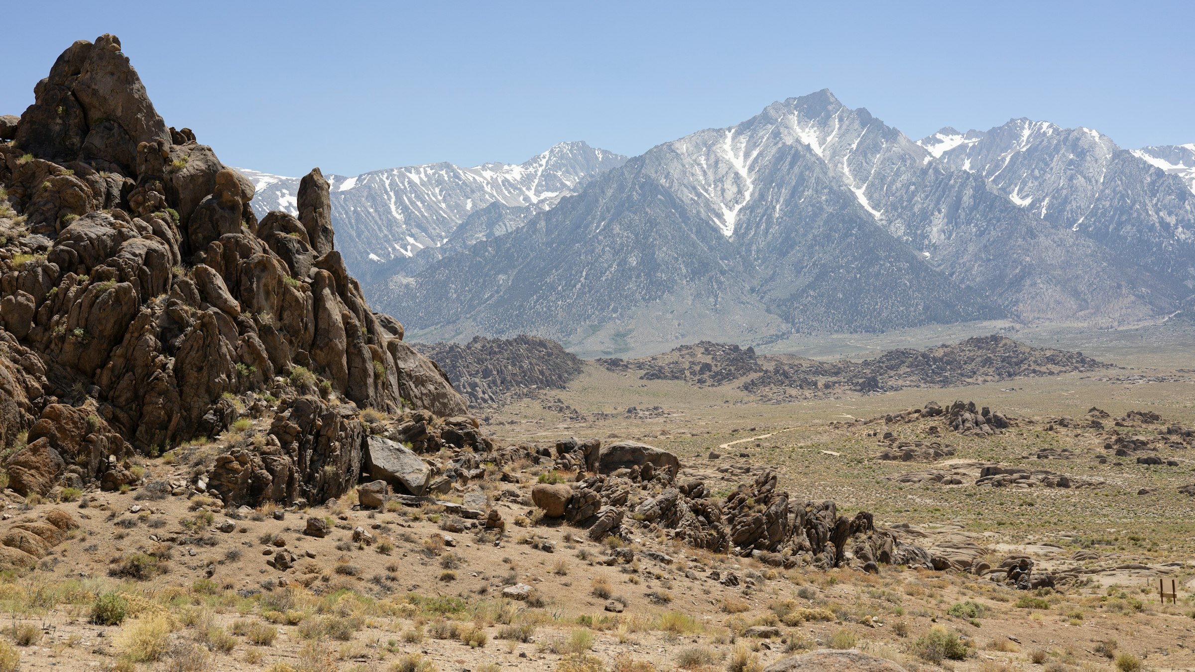 Granite formations and the high peaks behind