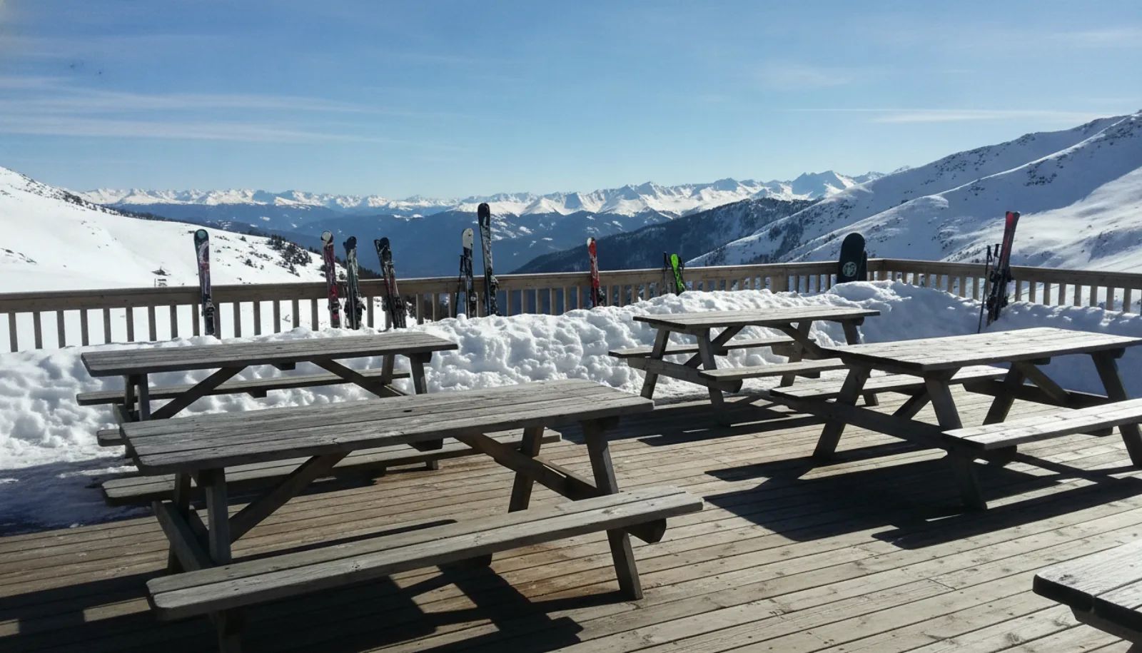 The base lodge deck on a bluebird day