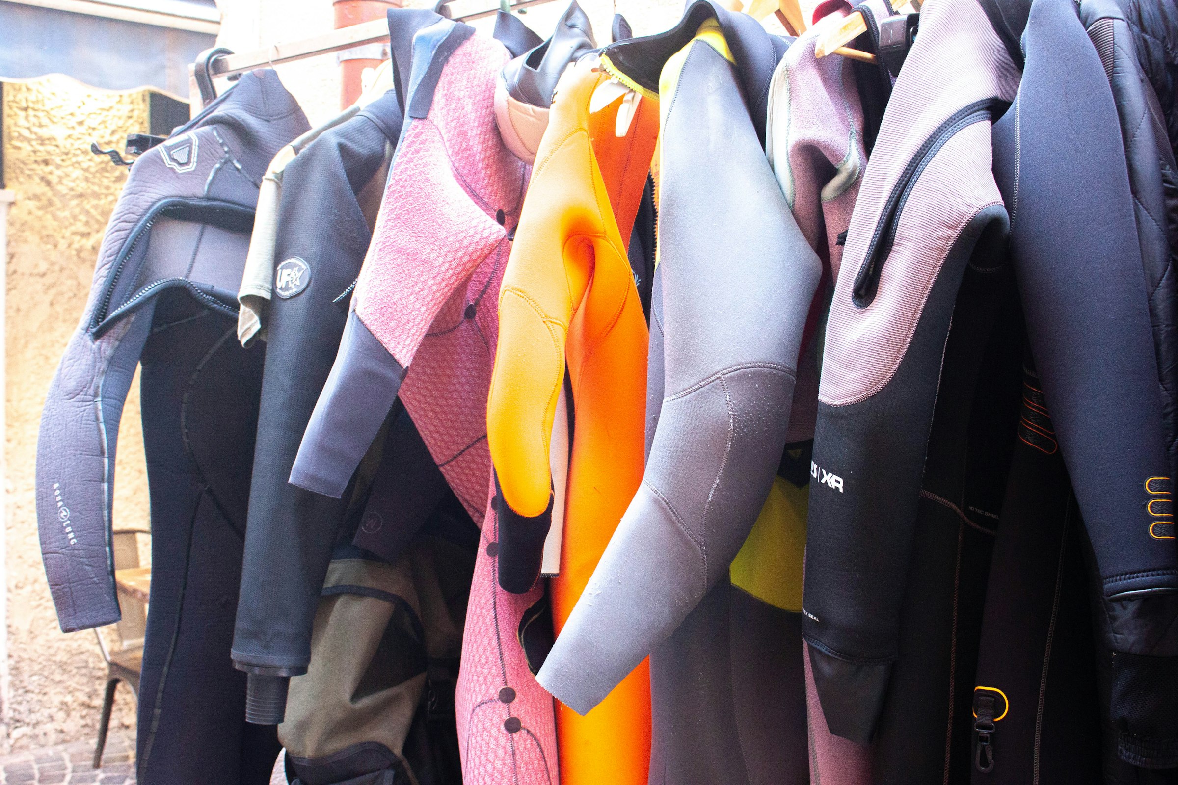 Wetsuits on the rail, every size